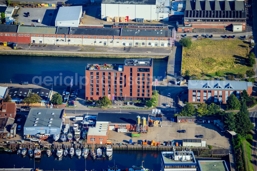 Cuxhaven from the bird's eye view: Travel of a ferry ship Katamaran Halunder Jet der FRS Reederei in Cuxhaven habour in the state Lower Saxony, Germany