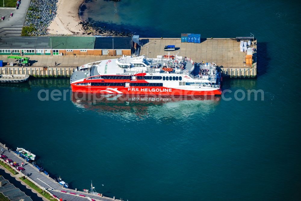 Aerial image Cuxhaven - Travel of a ferry ship Katamaran Halunder Jet der FRS Reederei in Cuxhaven habour in the state Lower Saxony, Germany