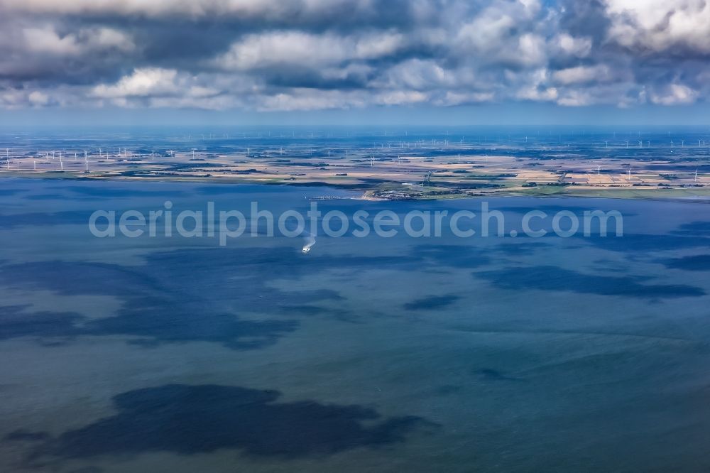 Dagebüll from the bird's eye view: Driving a ferry ship in the North Frisian Wadden Sea in Dagebuell in the state Schleswig-Holstein, Germany