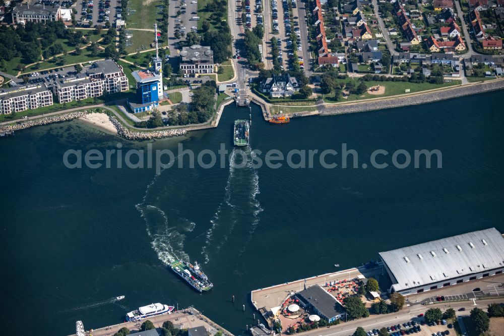 Hohe Düne from above - Driving a car ferry ship on the Warnow between Warnemuende and Hohe Duene on the Baltic Sea coast in the state of Mecklenburg-West Pomerania, Germany