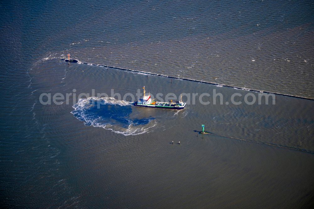 Aerial image Norden - Trip of a silt ship Nordeich Seekrabe in Norden Norddeich in the state of Lower Saxony, Germany