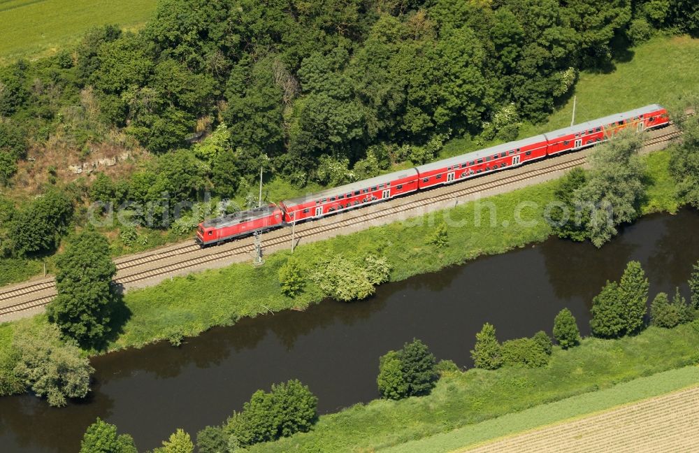 Wichmar from above - Ride a train on the track along the Saale in the district Wuerchhausen in Wichmar in the state Thuringia, Germany