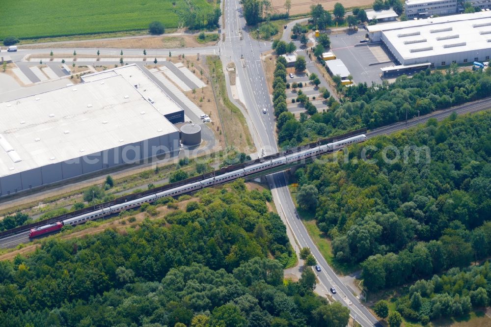 Göttingen from the bird's eye view: Ride a train on the track Kassel-Goettingen in Goettingen in the state Lower Saxony, Germany