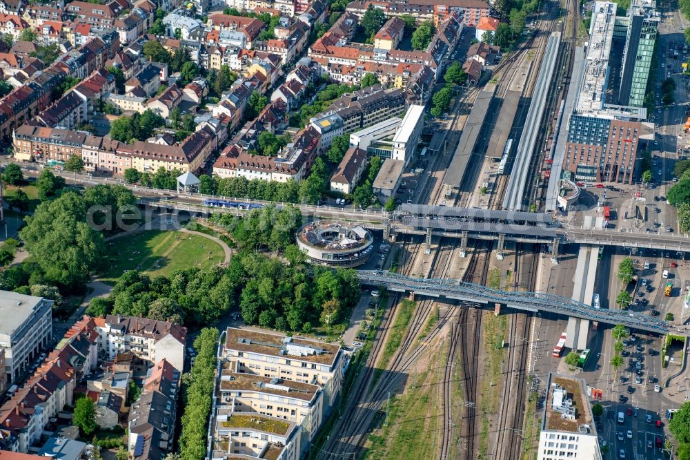 Freiburg im Breisgau from the bird's eye view: Ride a train on the track Rheintalstrecke Freiburg in Freiburg im Breisgau in the state Baden-Wuerttemberg, Germany