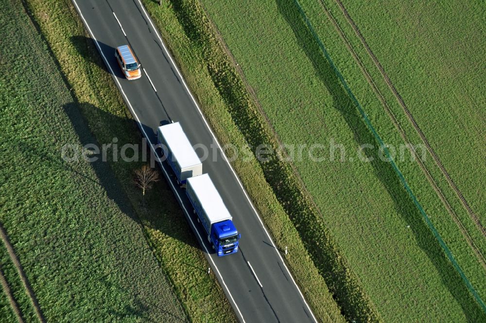 Aerial image Krostitz - Motor vehicles in traffic along the Landstrasse S4 in Krostitz in the state Saxony