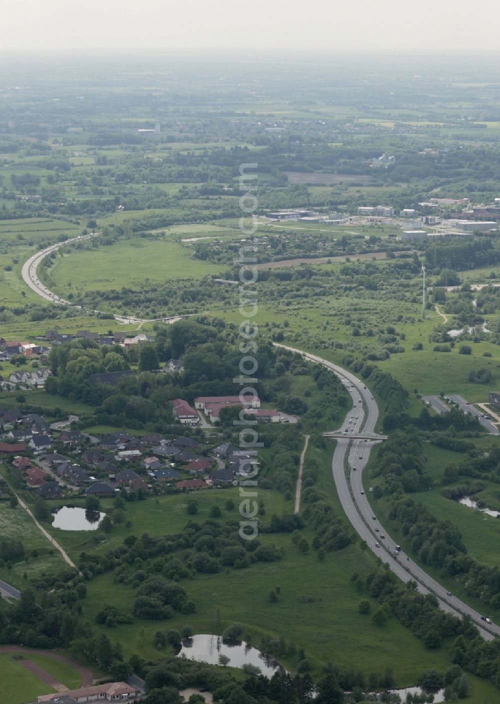 Aerial image Flensburg - Motor vehicles in traffic along the Ostumgehung in Flensburg in the state Schleswig-Holstein