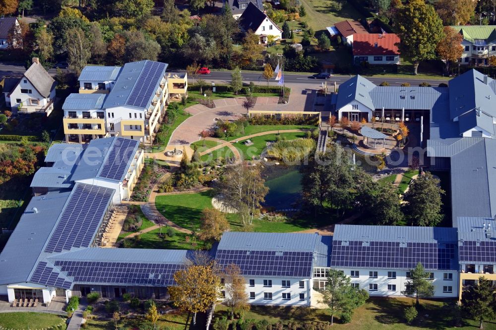 Aerial photograph Trassenheide - View of the family wellness hotel Seeklause in Trassenheide on Usedom in the state Mecklenburg-Vorpommern. The hotel offers in addition to numerous leisure activities such as Volleyball, bicycle hire and table tennis, wellness with saunas and massages