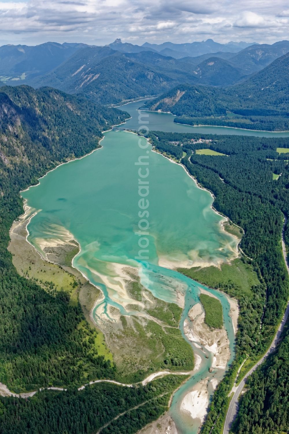 Lenggries from above - Play of colors on the river delta of Sylvenstein lake in Isarwinkel at Vorderriss in Bavaria, Germany. The Sylvensteinsee is a reservoir of Isar, Duerrach and Walchen built for flood protection in the Isar valley. Hydropower plants at the dam are used for power generation