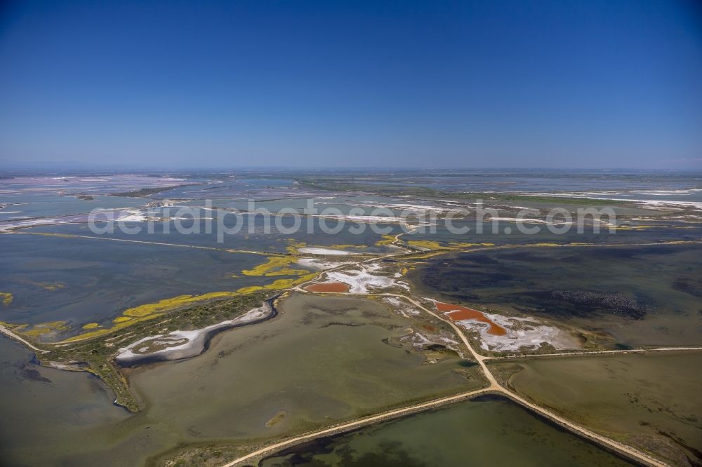 Aerial photograph Saintes-Maries-de-la-Mer - Colored Salinen- landscape in Saintes-Maries-de-la-Mer in France