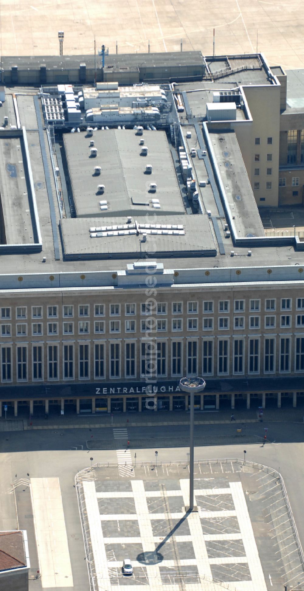 Berlin from above - Facade of the monument Flughafen Tempelhof on Platz of Luftbruecke in Berlin, Germany