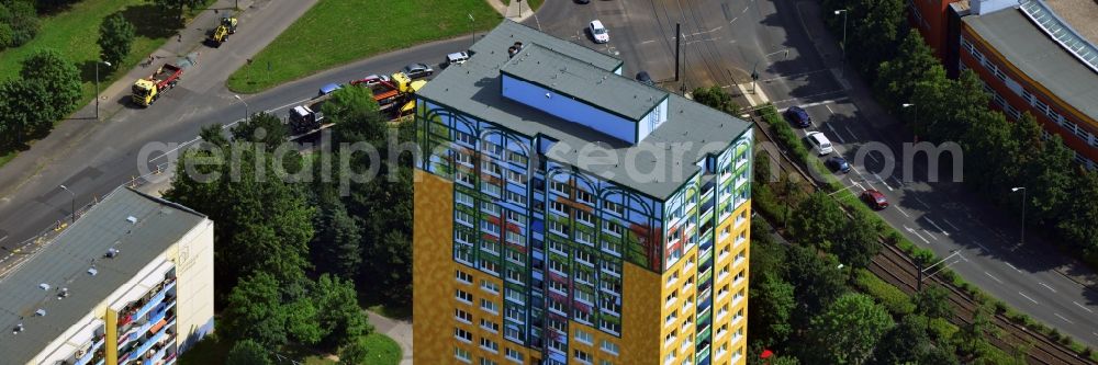 Berlin Marzahn from the bird's eye view: Facade paintings on a residential high-rise on the all the cosmonauts in Marzahn Berlin