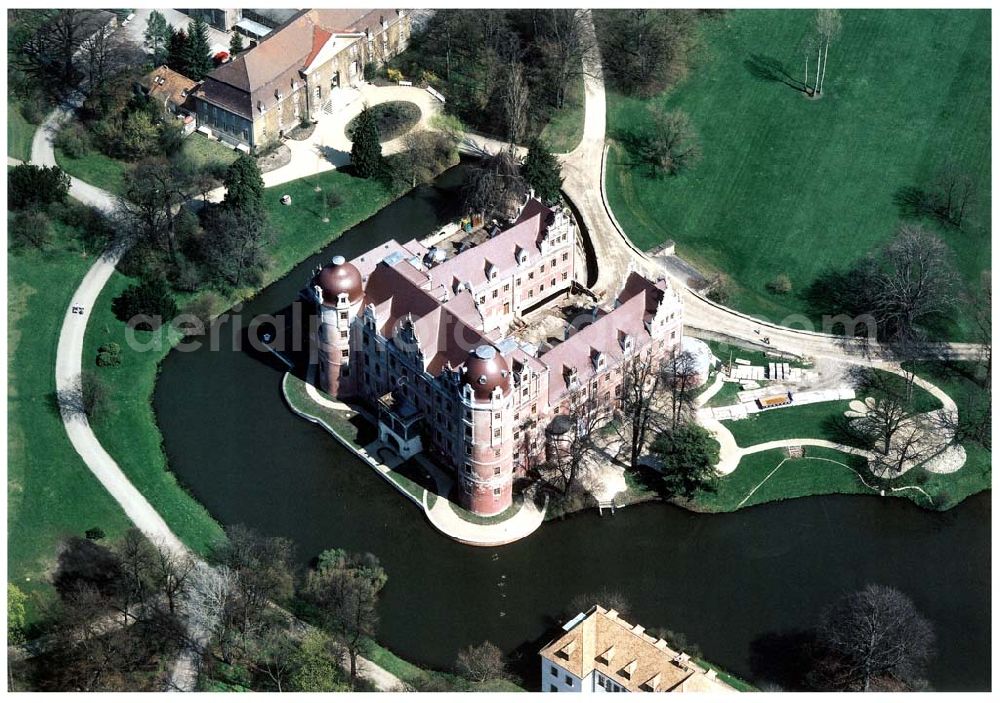 Aerial photograph Bad Muskau - Fast fertig rekonstruiertes Schloß in Bad Muskau im Fürst - Pückler - Parkes an der Neiße zur polnischen Grenze.