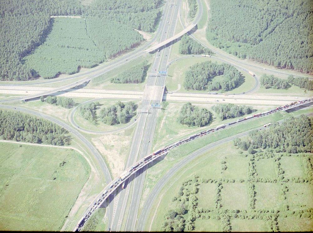 Schönefeld / Brandenburg from the bird's eye view: Fast fertig umgebautes Autobahnkreuz Schönefeld am Berliner Ring in Brandenburg.