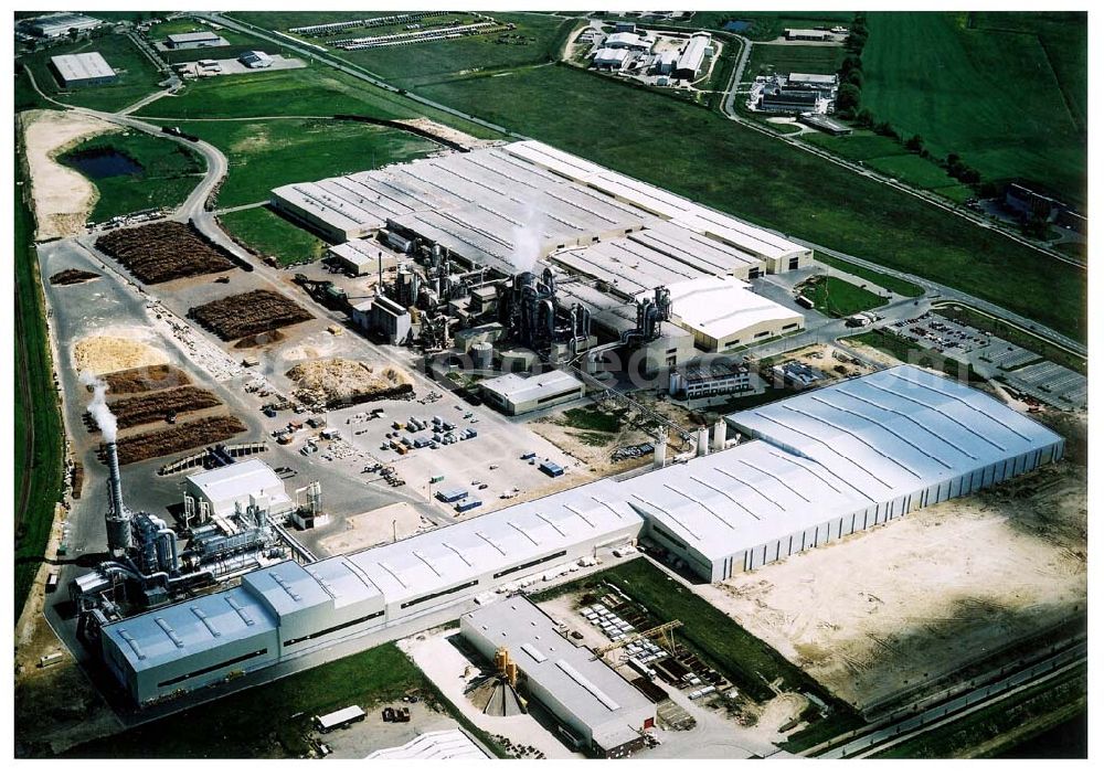 Heiligengrabe from the bird's eye view: Fast fertige Erweiterungsbaustellen am Werksgelände der KRONOTEX GmbH im Gewerbegebiet Heiligengrabe.