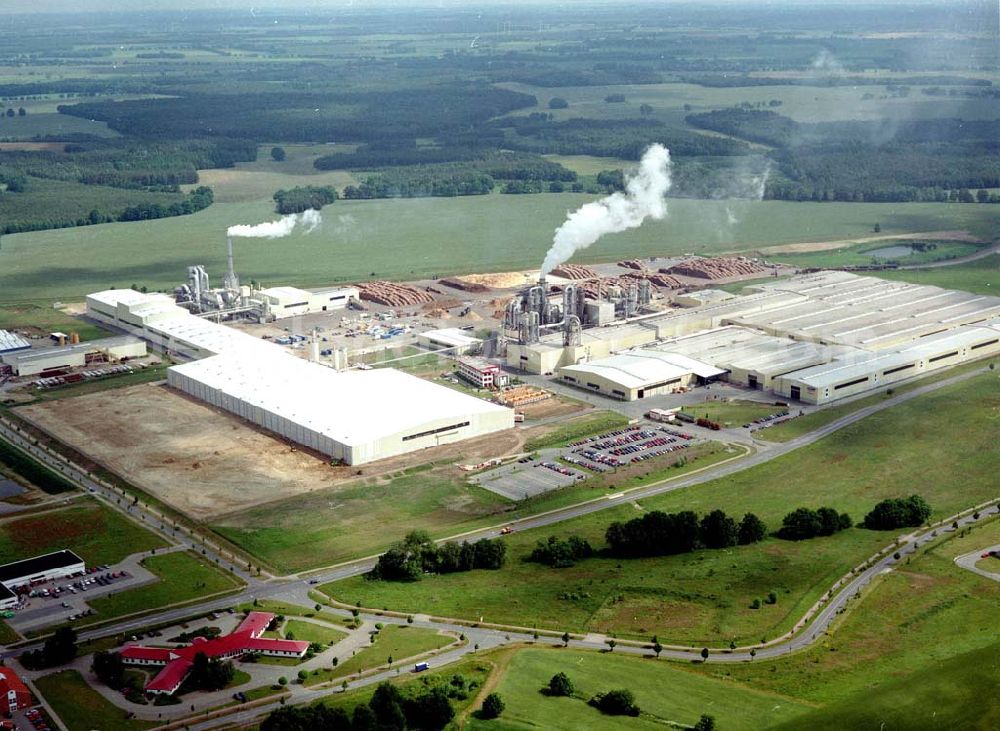 Heiligengrabe from the bird's eye view: Fast fertige Erweiterungsbaustellen am Werksgelände der KRONOTEX GmbH im Gewerbegebiet Heiligengrabe.