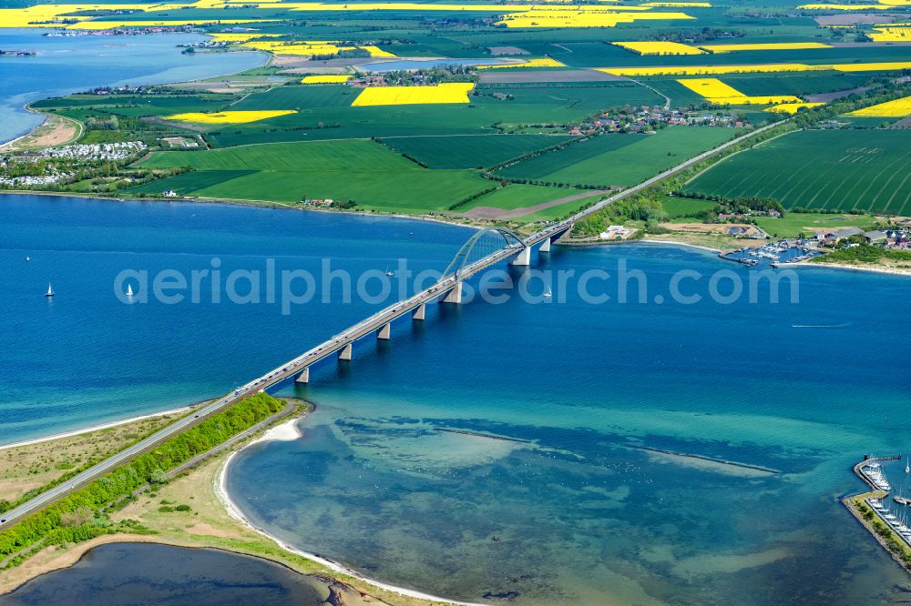 Fehmarn from above - Construction of the pier Fehmarnsundbruecke over the water surface of the Fehmarnsund of the Baltic Sea on the E47 road in Fehmarn on the island of Fehmarn in the federal state of Schleswig-Holstein, Germany