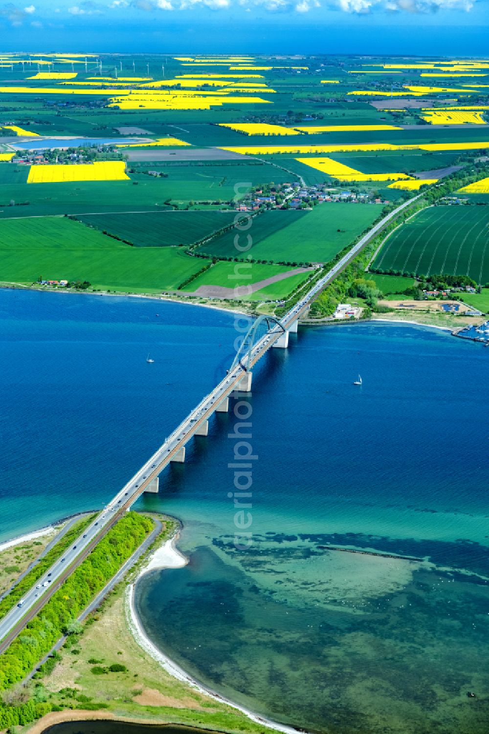 Aerial photograph Fehmarn - Construction of the pier Fehmarnsundbruecke over the water surface of the Fehmarnsund of the Baltic Sea on the E47 road in Fehmarn on the island of Fehmarn in the federal state of Schleswig-Holstein, Germany