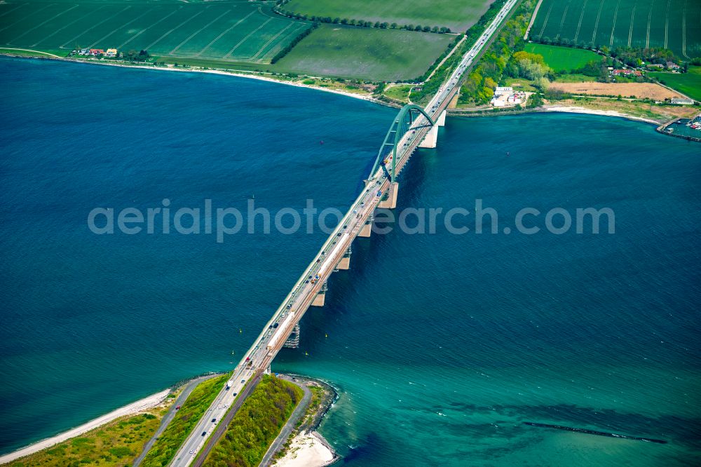 Aerial image Fehmarn - Construction of the pier Fehmarnsundbruecke over the water surface of the Fehmarnsund of the Baltic Sea on the E47 road in Fehmarn on the island of Fehmarn in the federal state of Schleswig-Holstein, Germany