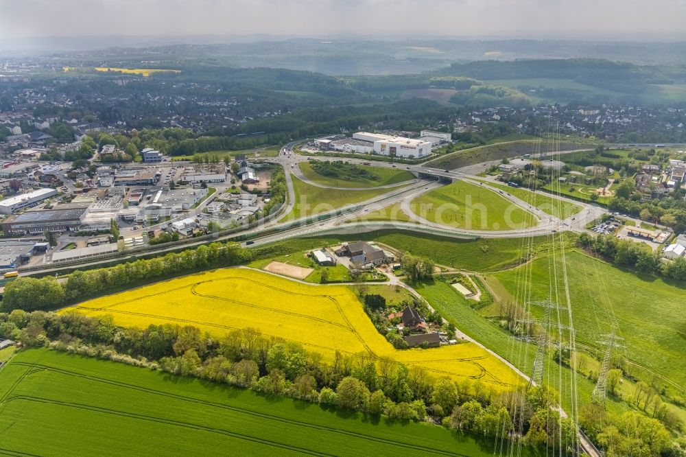 Aerial photograph Birth - Field landscape yellow flowering rapeseed flowers in Birth in the state North Rhine-Westphalia, Germany