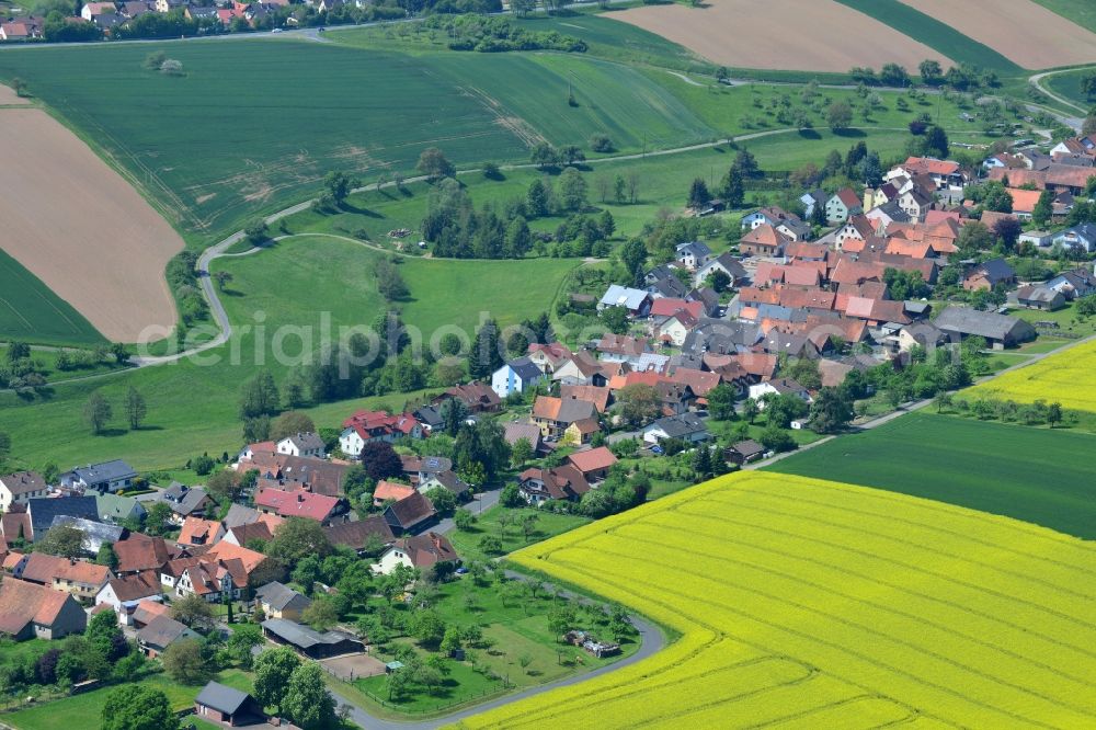 Aerial image Karbach - Field landscape yellow flowering rapeseed flowers in Karbach in the state Bavaria