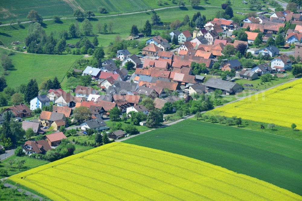 Aerial photograph Karbach - Field landscape yellow flowering rapeseed flowers in Karbach in the state Bavaria