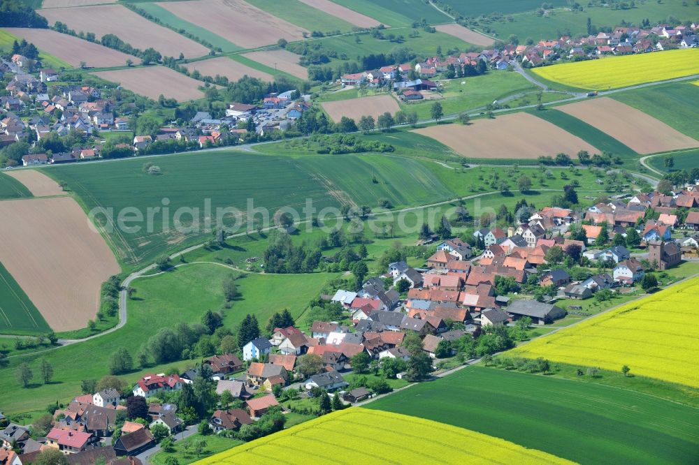 Karbach from above - Field landscape yellow flowering rapeseed flowers in Karbach in the state Bavaria