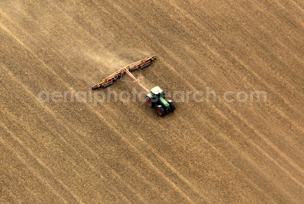 Aerial image Volkenroda - Ploughing tractor at Volkenroda in Thuringia