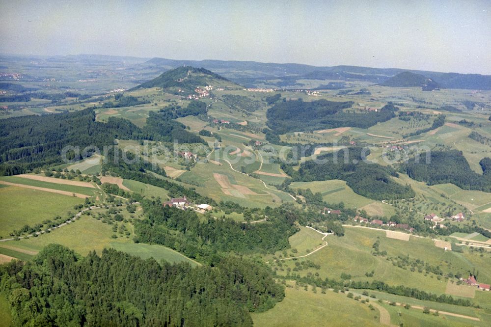 Heubach from above - Agricultural fields with adjacent forest and forest areas and the Burgruine Rosenstein in Heubach in the state Baden-Wuerttemberg, Germany