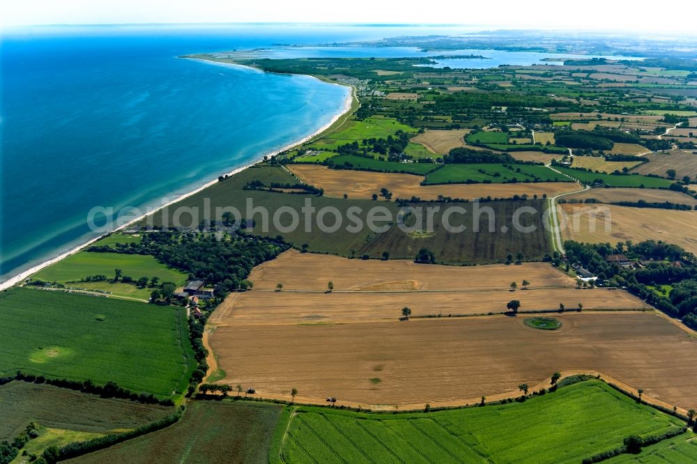 Kronsgaard from above - Agricultural fields with adjacent forest and forest areas at Golsmaas in Pommerby in the state Schleswig-Holstein, Germany