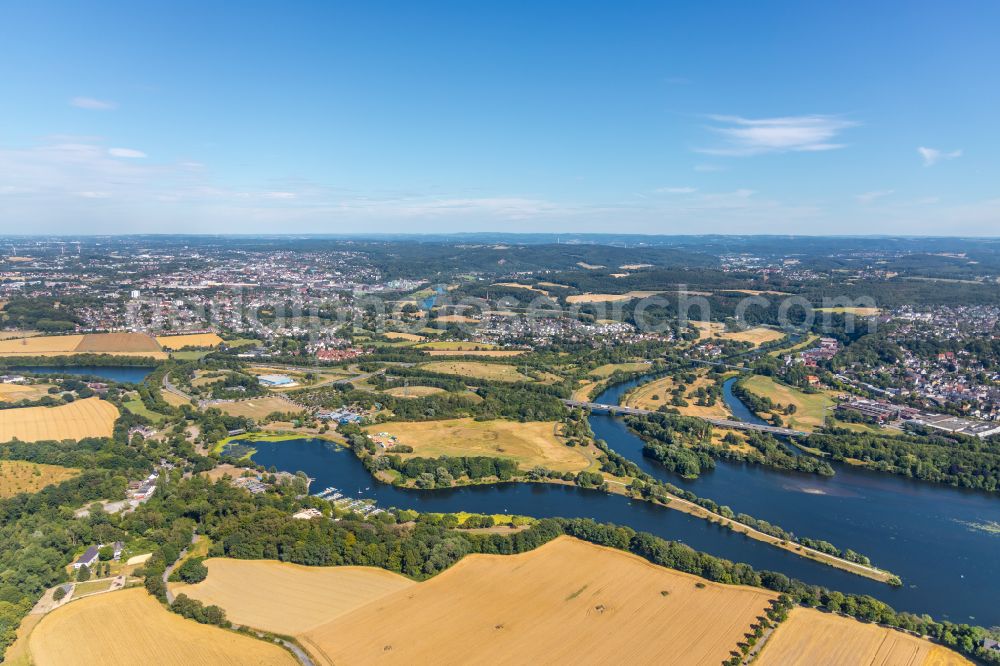 Querenburg from the bird's eye view: Agricultural fields with adjacent forest and forest areas on the banks of Lake Kemnader in Querenburg in the state North Rhine-Westphalia, Germany