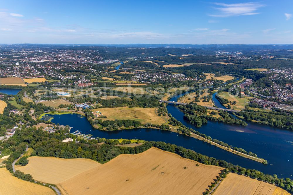 Aerial image Querenburg - Agricultural fields with adjacent forest and forest areas on the banks of Lake Kemnader in Querenburg in the state North Rhine-Westphalia, Germany