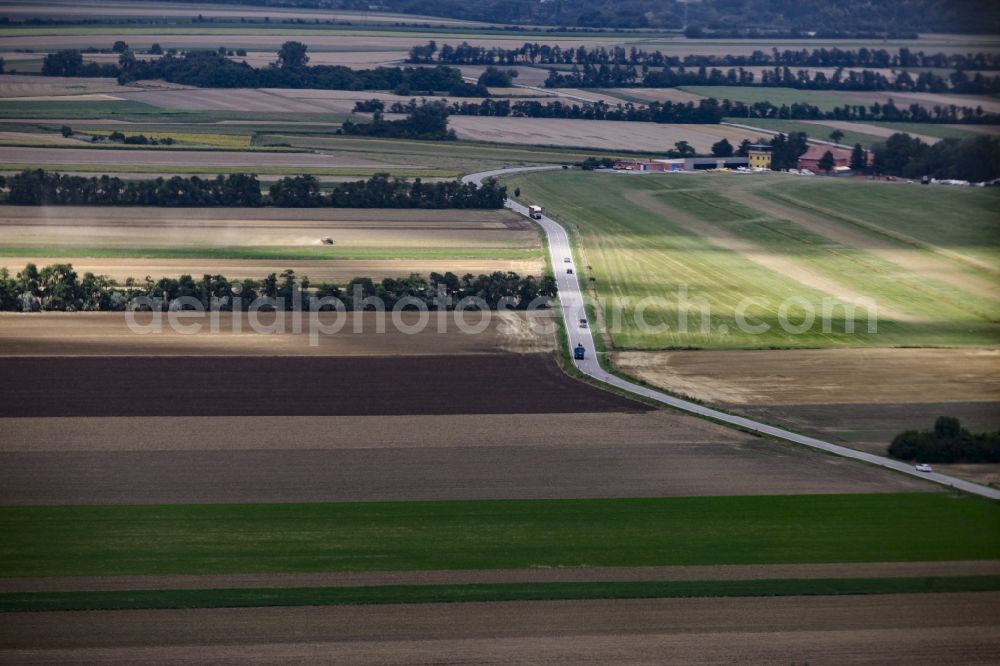 Hundsheim from the bird's eye view: Fields and landscape at the aerial sports center Spitzerberg in front of mountain Braunsberg in Hundsheim in Lower Austria, Austria