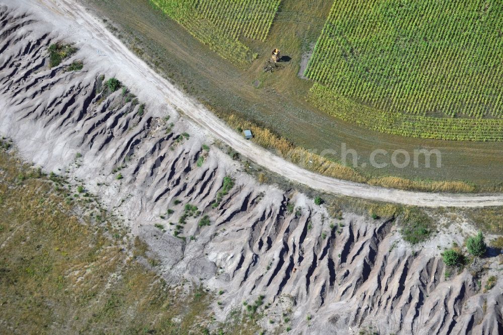 Grünewalde from above - Field edge to the slag heap of brown coal mining - mining landscape near Gruenwalde in Brandenburg