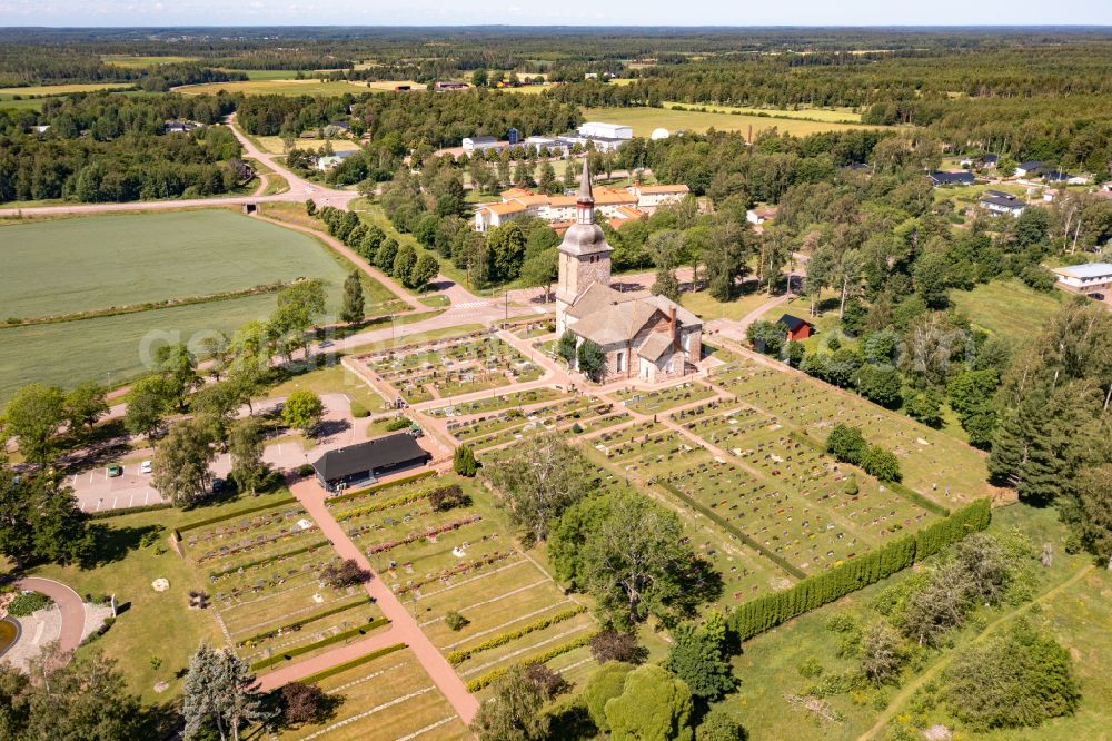 Jättböle from above - Church building Jomala kyrka a stone church in the village center in Jaettboele in Alands landsbygd, Aland