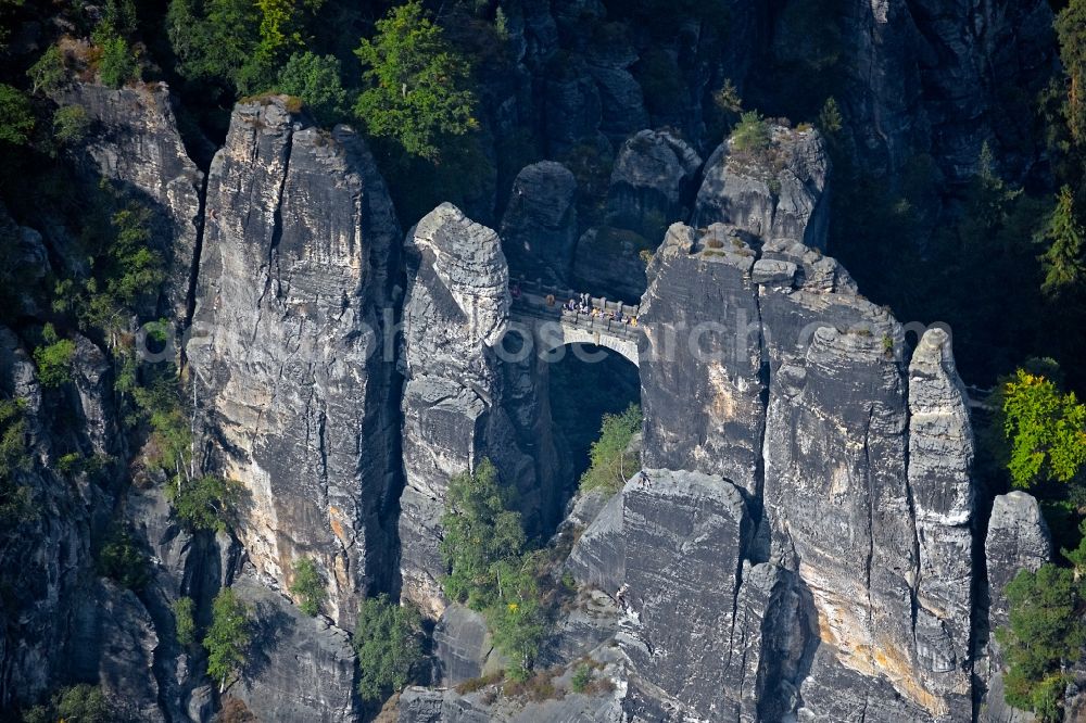 Rathen from above - Rock and mountain landscape of the Basteigebiet in Rathen in the state Saxony