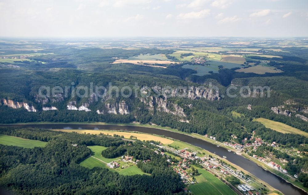 Rathen from above - Rock and mountain landscape of Elbsandsteingebirges in Rathen in the state Saxony, Germany