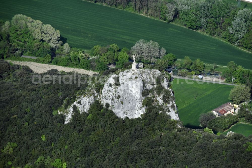 Viviers from the bird's eye view: Rock and mountain landscape with Angel monument in Viviers in Auvergne Rhone-Alpes, France