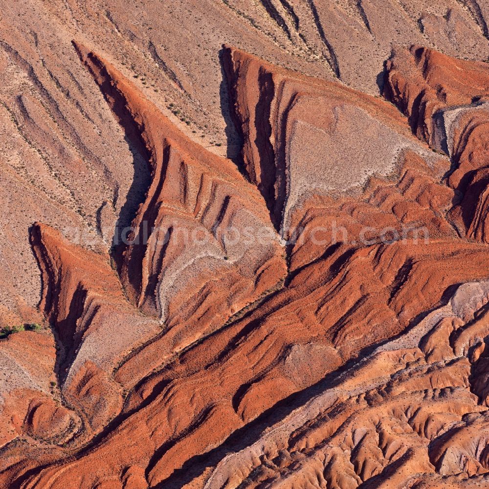 Colorado Plateau from above - Rock and mountain landscape near Blanding on the Colorado Plateau in Utah, United States of America. Sandstone layers that have been tilted and then eroded by runnoff water can sometimes form zigzag shapes. - they occur frequently in the semideserts of the southwestern United States, in the area of the Colorado Plateau, where these formations are described as 'flat irons'