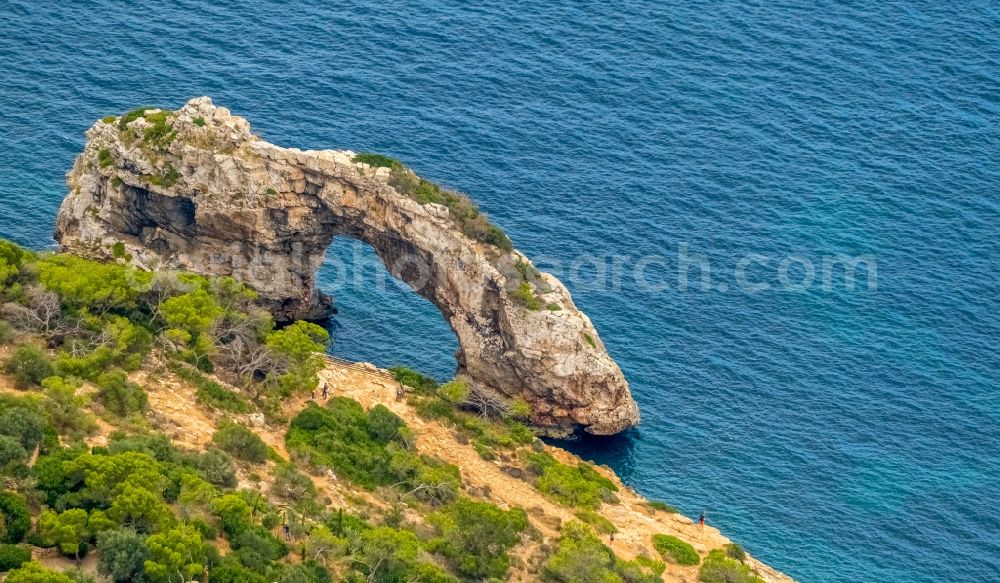 Santany from the bird's eye view: Rock Coastline on the cliffs with the rock formation Mirador des Pontas on the Balearic Sea in Santany in Islas Baleares, Spain