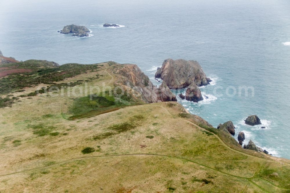 Aldernay from the bird's eye view: Rock Coastline on the cliffs in Alderney, Guernsey