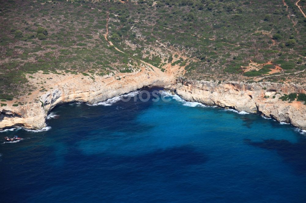 Aerial image Manacor - Rock Coastline on the cliffs at Porto Christo in Mallorca in Balearic Islands, Spain