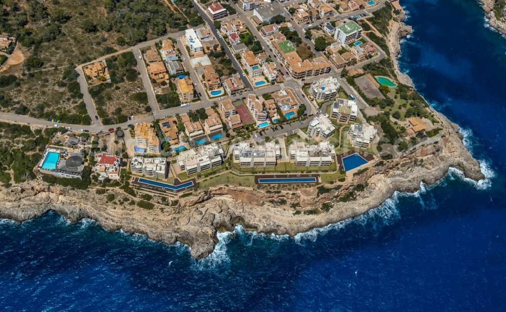 Aerial photograph Cala Figuera - Rock Coastline on the cliffs with Hotels in Cala Figuera in Balearic island of Mallorca, Spain