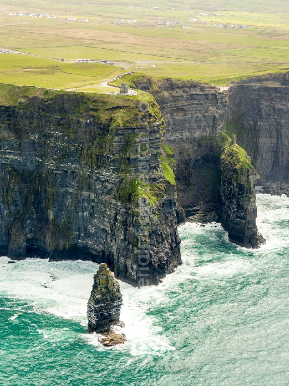 Cliffs of Moher from the bird's eye view: Rock Coastline on the cliffs North Atlantic Ocean in Cliffs of Moher in Clare, Ireland