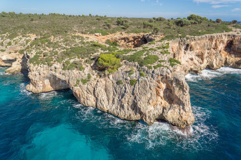 Manacor from above - Landscape with rocks cliffs of Manacor on the Mediterranean coast of the Spanish Balearic island of Mallorca in Spain