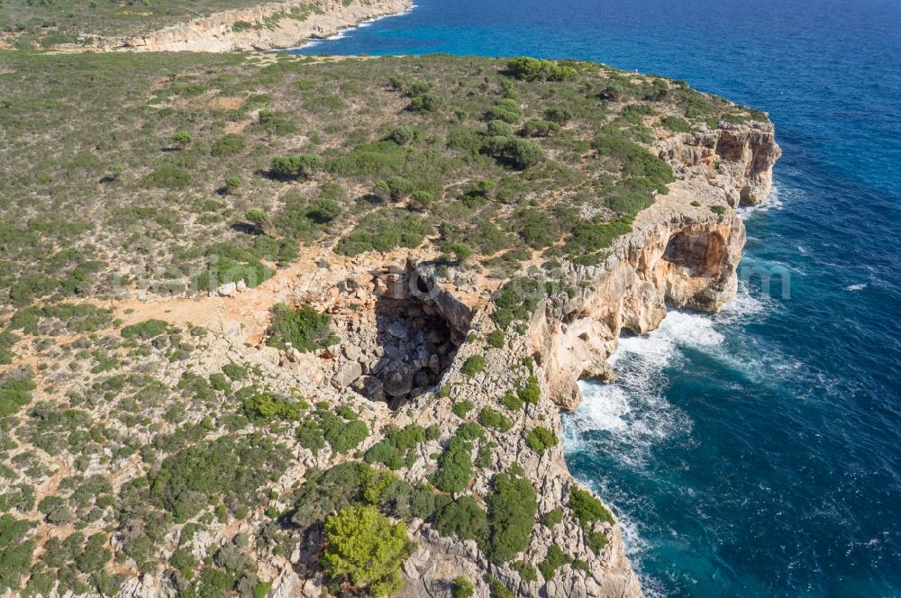 Manacor from the bird's eye view: Landscape with rocks cliffs of Manacor on the Mediterranean coast of the Spanish Balearic island of Mallorca in Spain