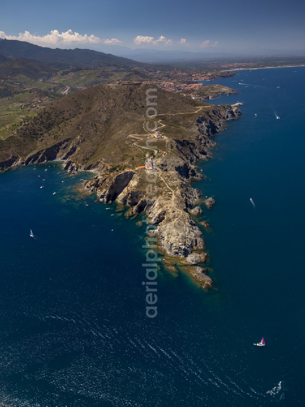 Port-Vendres from above - Crags Bear Cap with lighthouse on the Mediterranean coast in Port-Vendres in the province of Languedoc-Roussillon in France