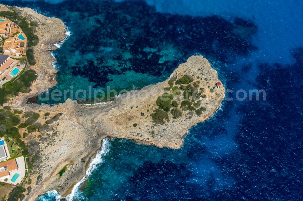 Manacor from the bird's eye view: Plateau in the water of Halbinsel Morro de Sa Carabassa with the lighthouse on Carrer de Cala Murta in Manacor in Balearic island of Mallorca, Spain