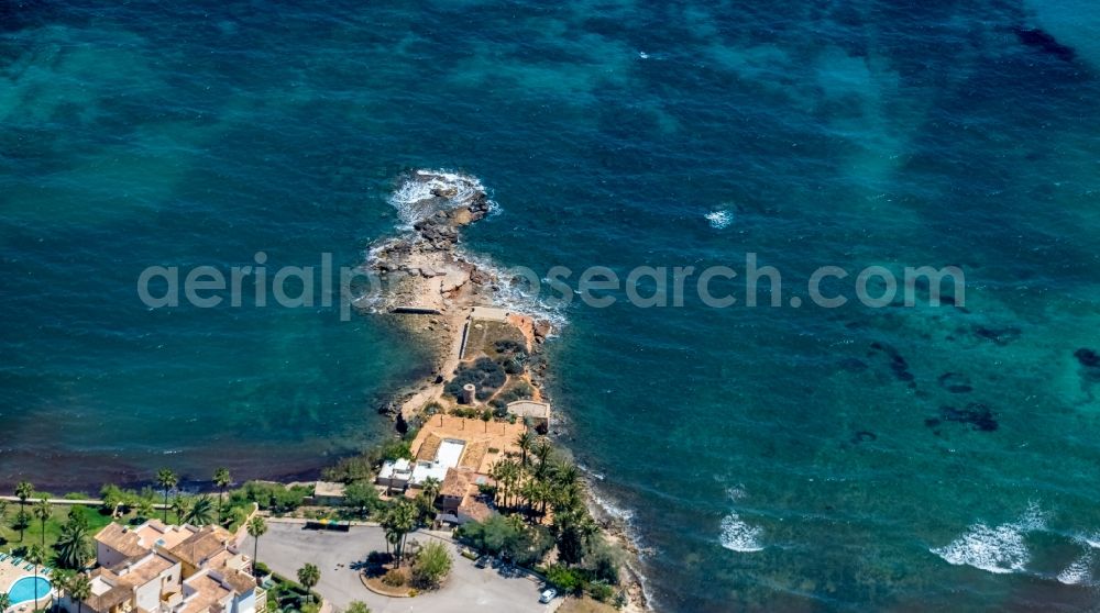 Son Servera from above - Plateau in the water of the peninsula Punta Roja with the restaurant Sa Punta Restaurant in Son Servera in Balearic island of Mallorca, Spain