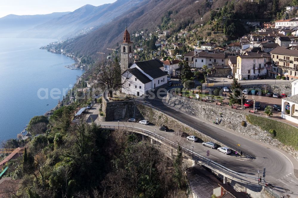 Ronco sopra Ascona from the bird's eye view: Overlooking the town Ronco and the San Martino church in the Swiss canton of Ticino Lake Maggiore. The village is on a rocky terrace in Ronco sopra Ascona in Switzerland