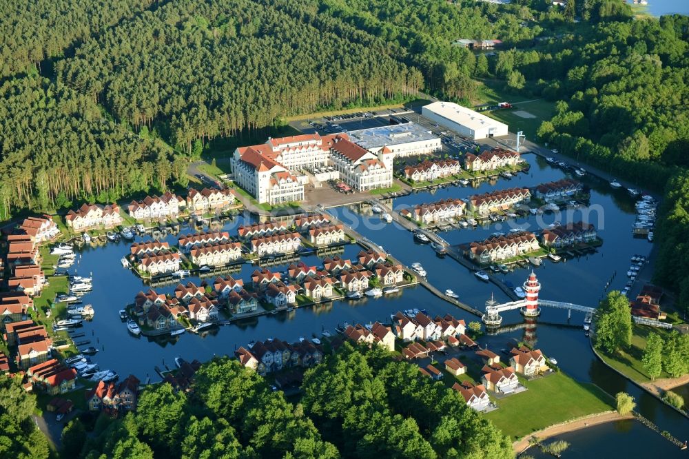 Rheinsberg from above - Summer cottage arrangement Summer cottage harbour village of Marinapark Rheinsberg in Rheinsberg in the federal state Brandenburg. The arrangement is pursued by the Roompot Vakanties, the Netherlands